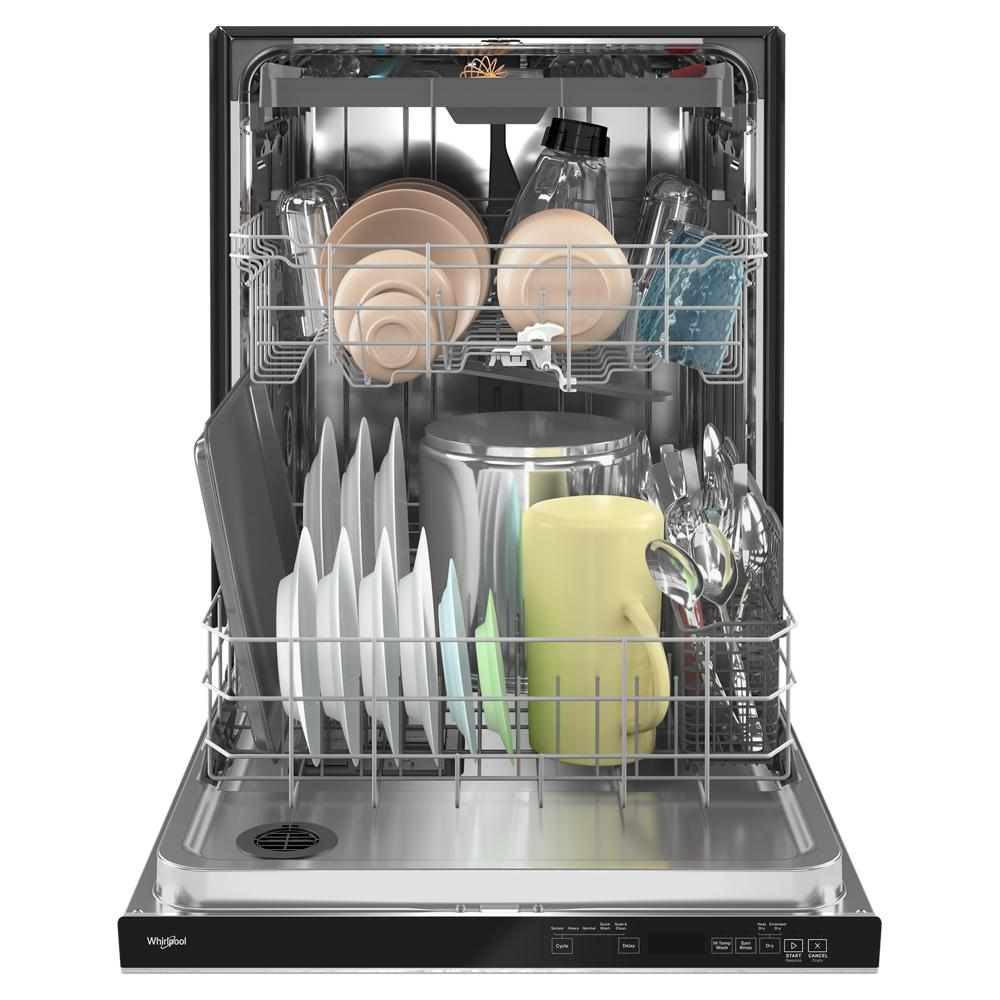 Open stainless steel dishwasher loaded with plates, cups, and utensils in kitchenware and appliance collection
