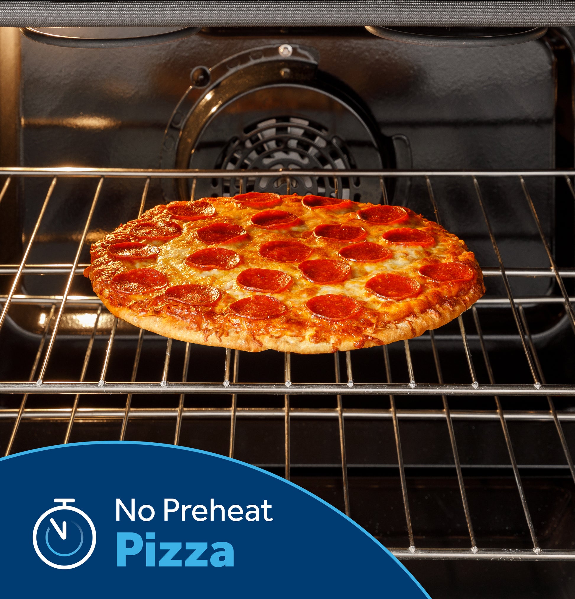 Pepperoni pizza cooking on rack inside black gas convection range from Ranges & Kitchenware collection