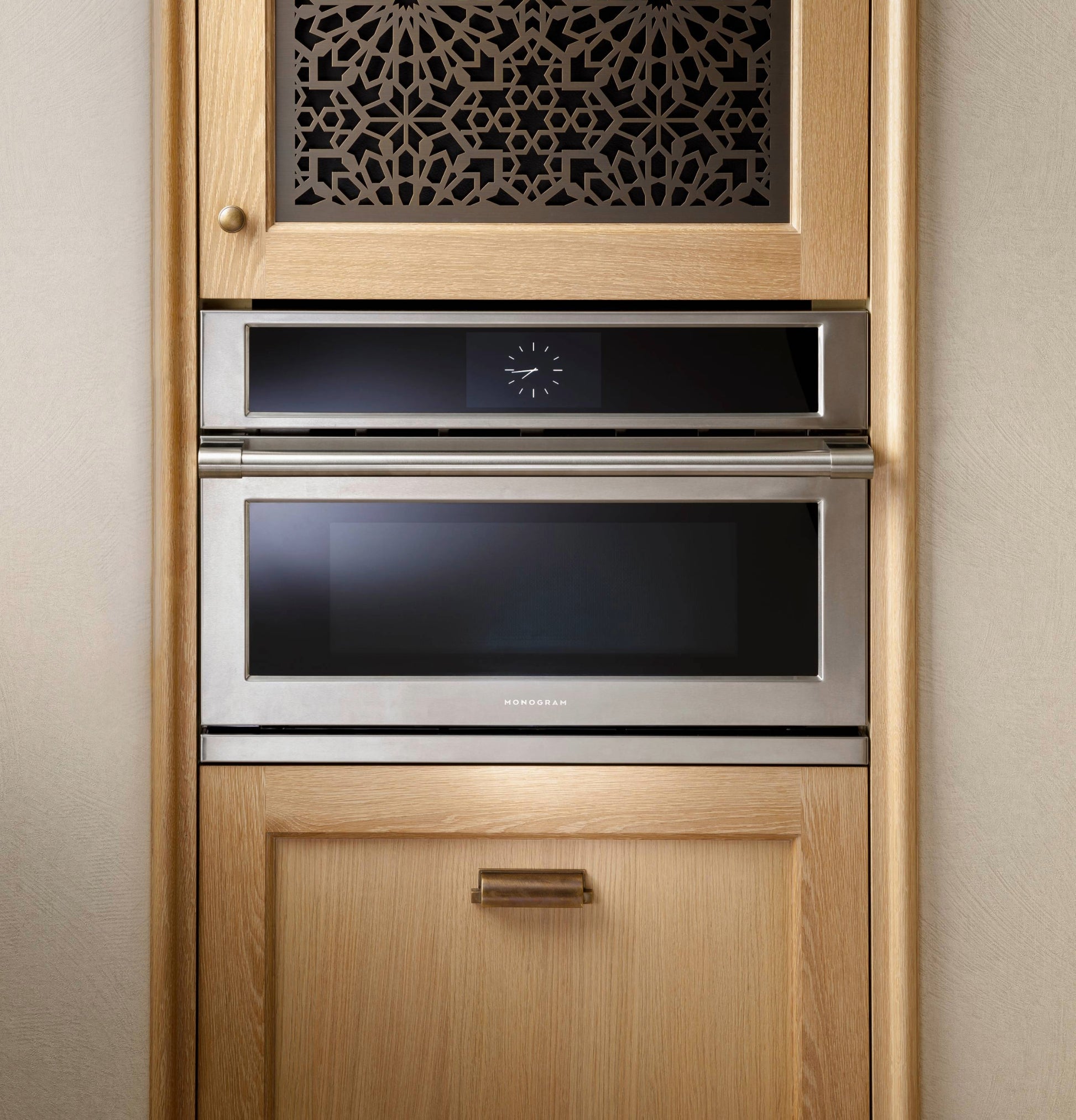 Built-in stainless steel wall oven with digital clock and sleek handle in Wall Ovens and Kitchen & Kitchenware collections