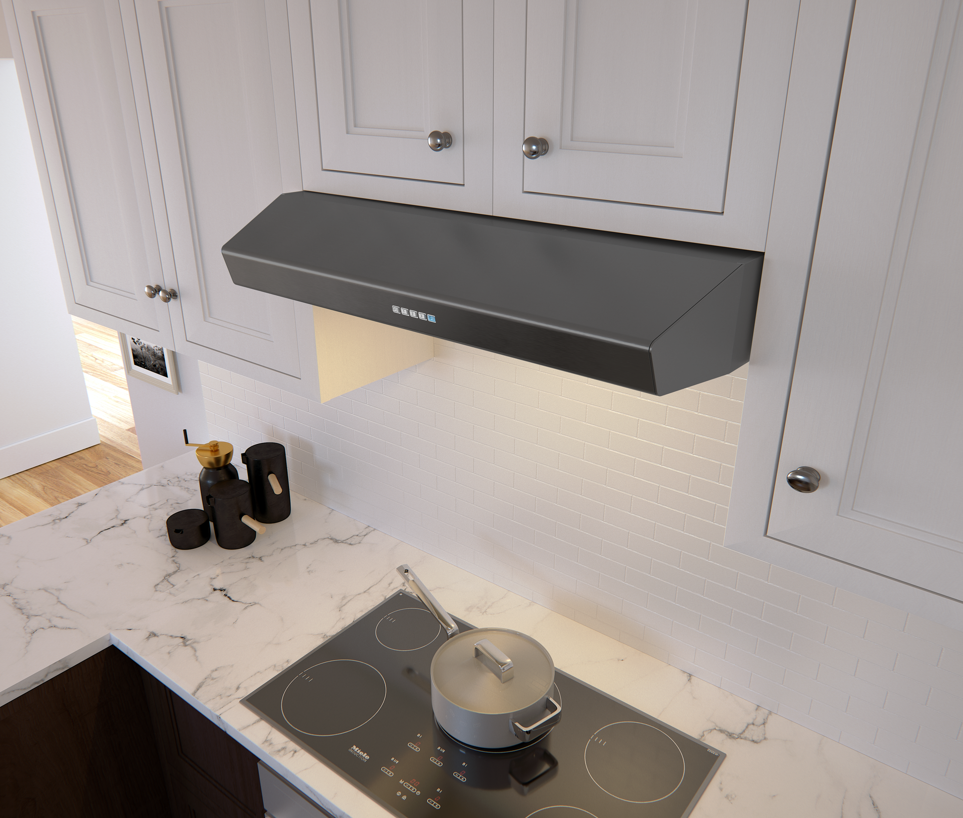Matte black under cabinet range hood with LED lights above electric cooktop and white kitchen cabinetry in appliances collection