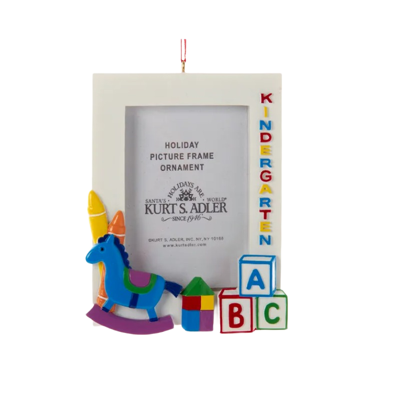 Christmas ornament picture frame with colorful kindergarten blocks, crayons, and a rocking horse decoration