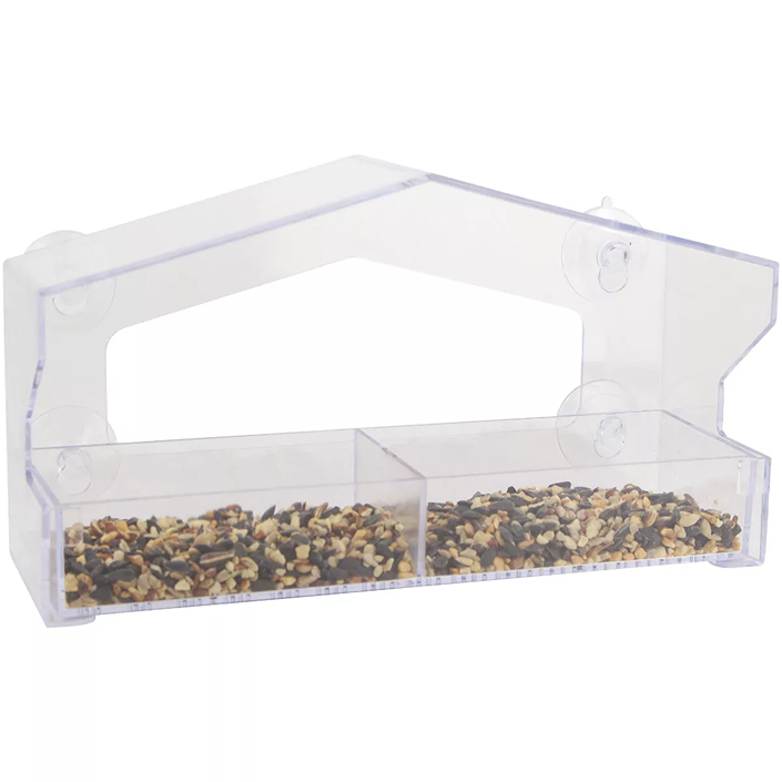 Clear plastic window bird feeder with divided seed compartments and suction cups for easy attachment to glass surfaces