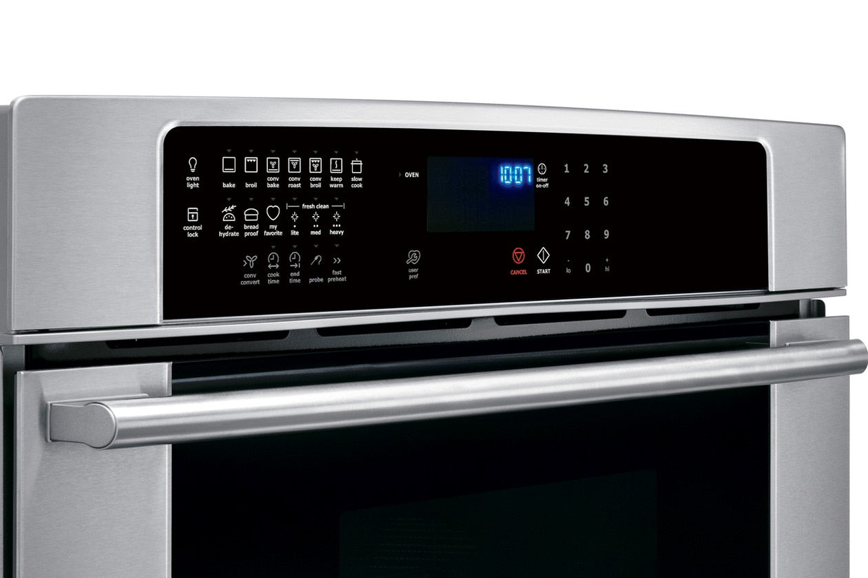 Stainless steel electric wall oven control panel with illuminated digital display and touch IQ-Touch™ controls for appliances
