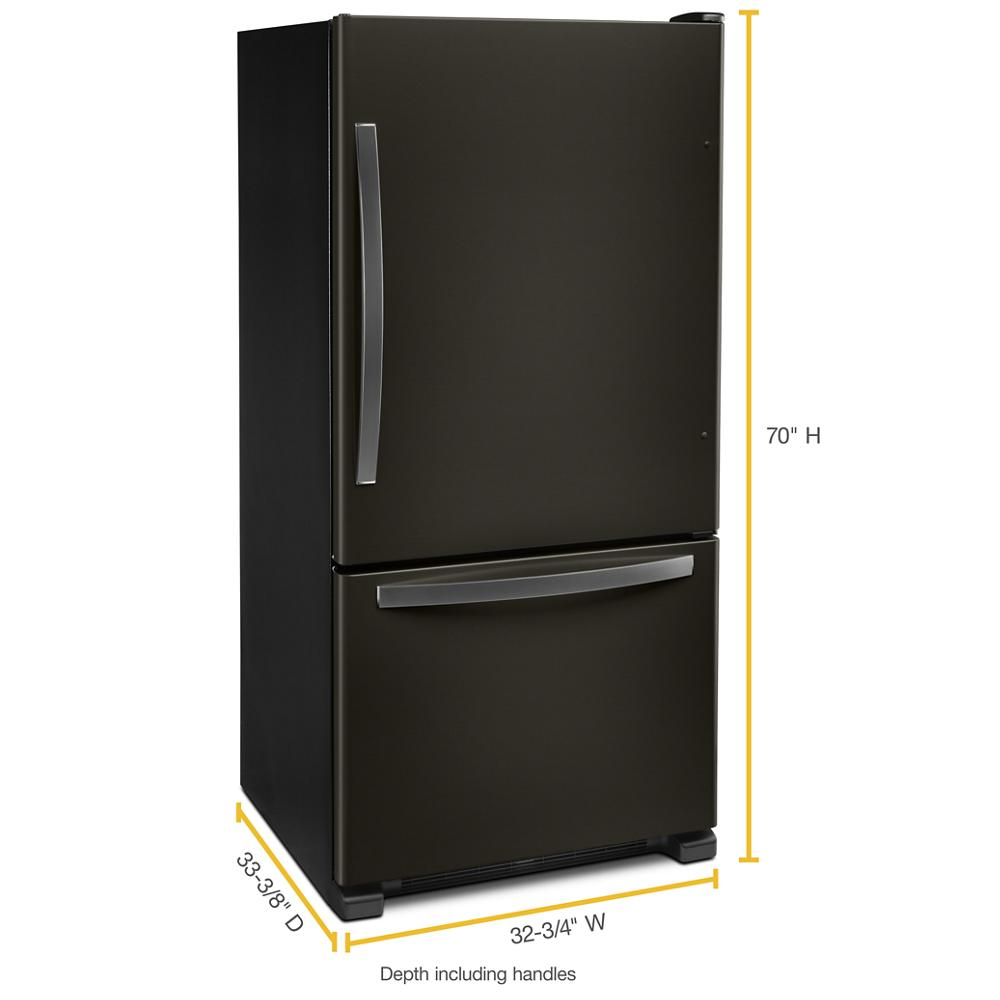 Matte black bottom freezer refrigerator with curved handles and clean lines in modern kitchen appliance style