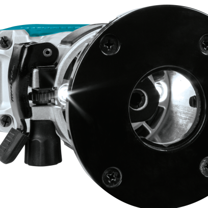 Close-up view of Makita cordless compact router focusing on base plate and motor housing for woodworking tools and home improvement tasks