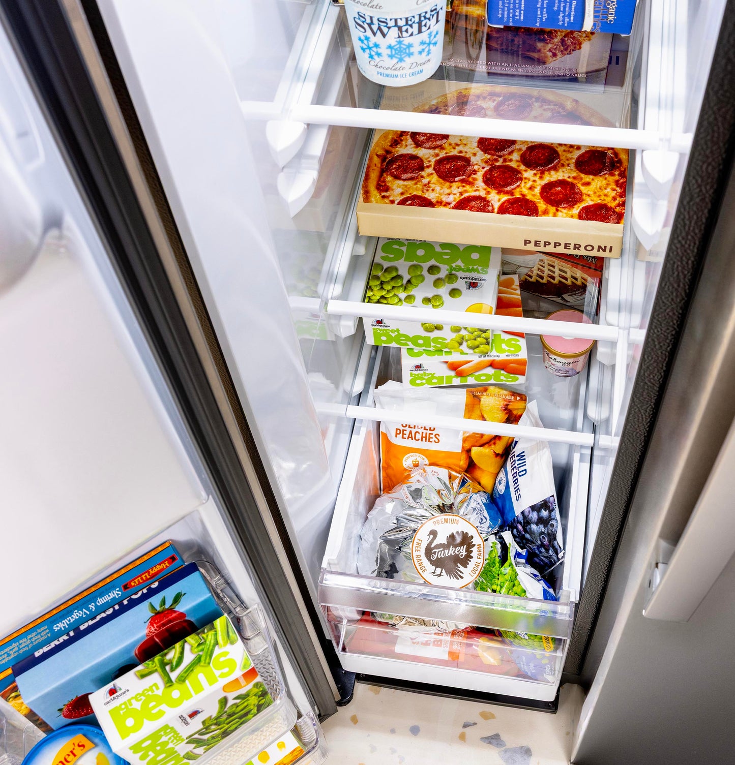 GE® ENERGY STAR® 23.6 Cu. Ft. Counter-Depth Side-By-Side Refrigerator with Extra Tall Dispenser and In-Door Icemaker