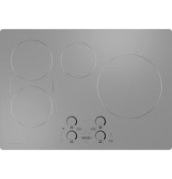 stainless steel 30-inch induction cooktop with four heating zones and front control knobs for kitchen appliances