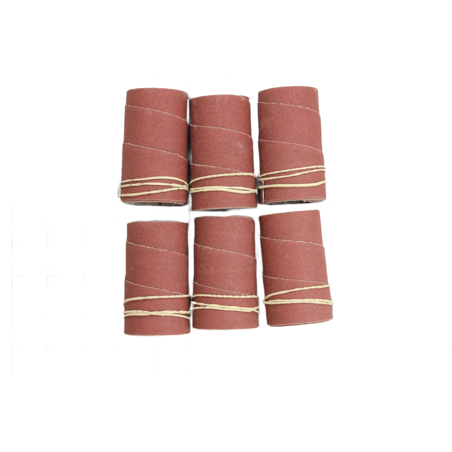 Six medium grit sandpaper strips rolled and secured with rubber bands for drum sanding tools in under $50 collection.