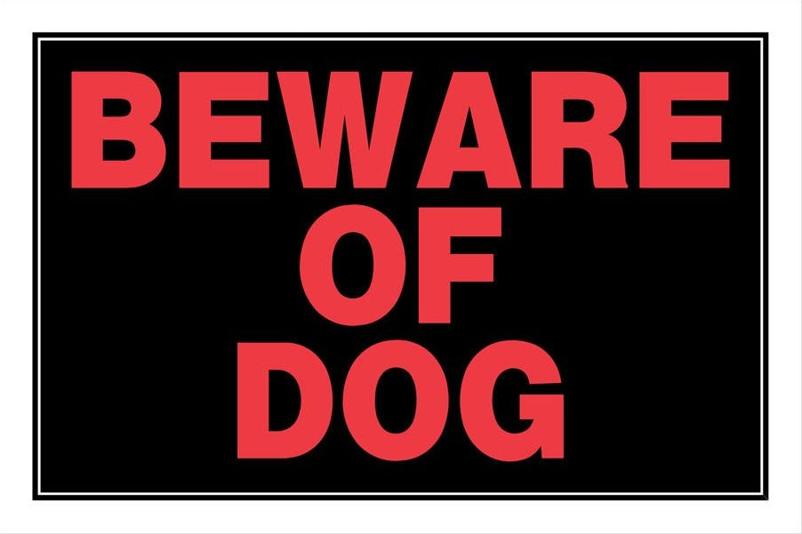 Black sign with bold red lettering stating beware of dog for home improvement and hardware use