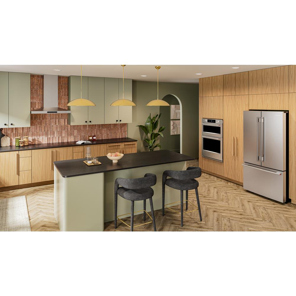 Modern kitchen featuring wood cabinetry, a 30-inch stainless steel electric combo wall oven, and a large island with seating