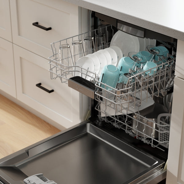 Open stainless steel dishwasher in modern kitchen with white and turquoise dishes on upper rack from dishwashers collection