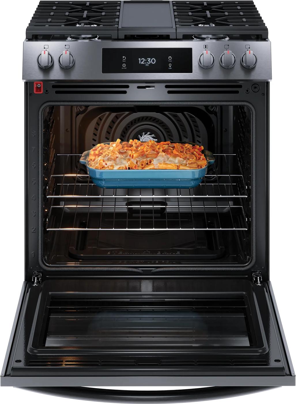 Gas range with front controls, digital display, and convection oven baking pasta casserole in blue dish for kitchen appliances