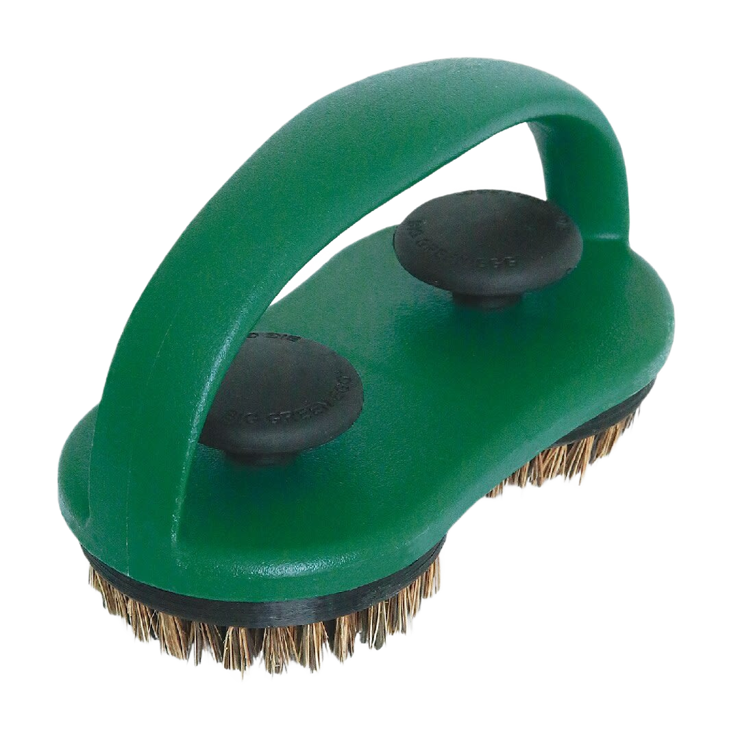 Dual-sided palm bristle grill brush with green handle and black knobs for effective outdoor grill cleaning.
