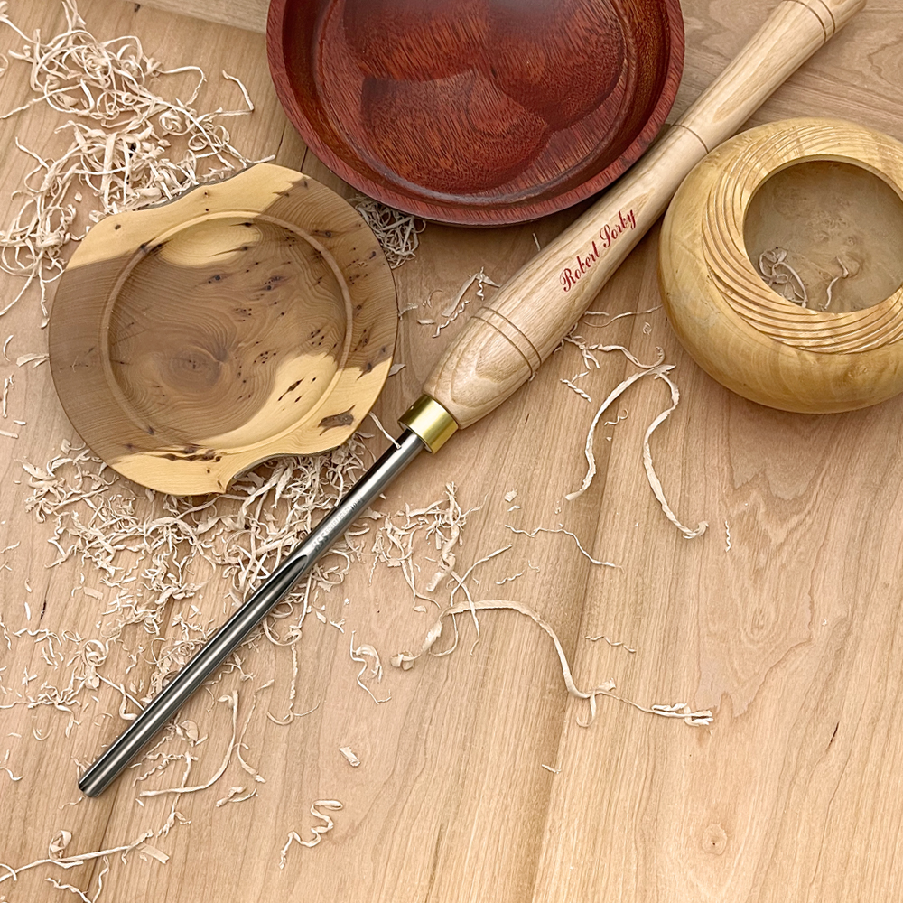 Woodturning bowl gouge with polished steel blade and wooden handle for detailed woodworking in Robert Sorby collection