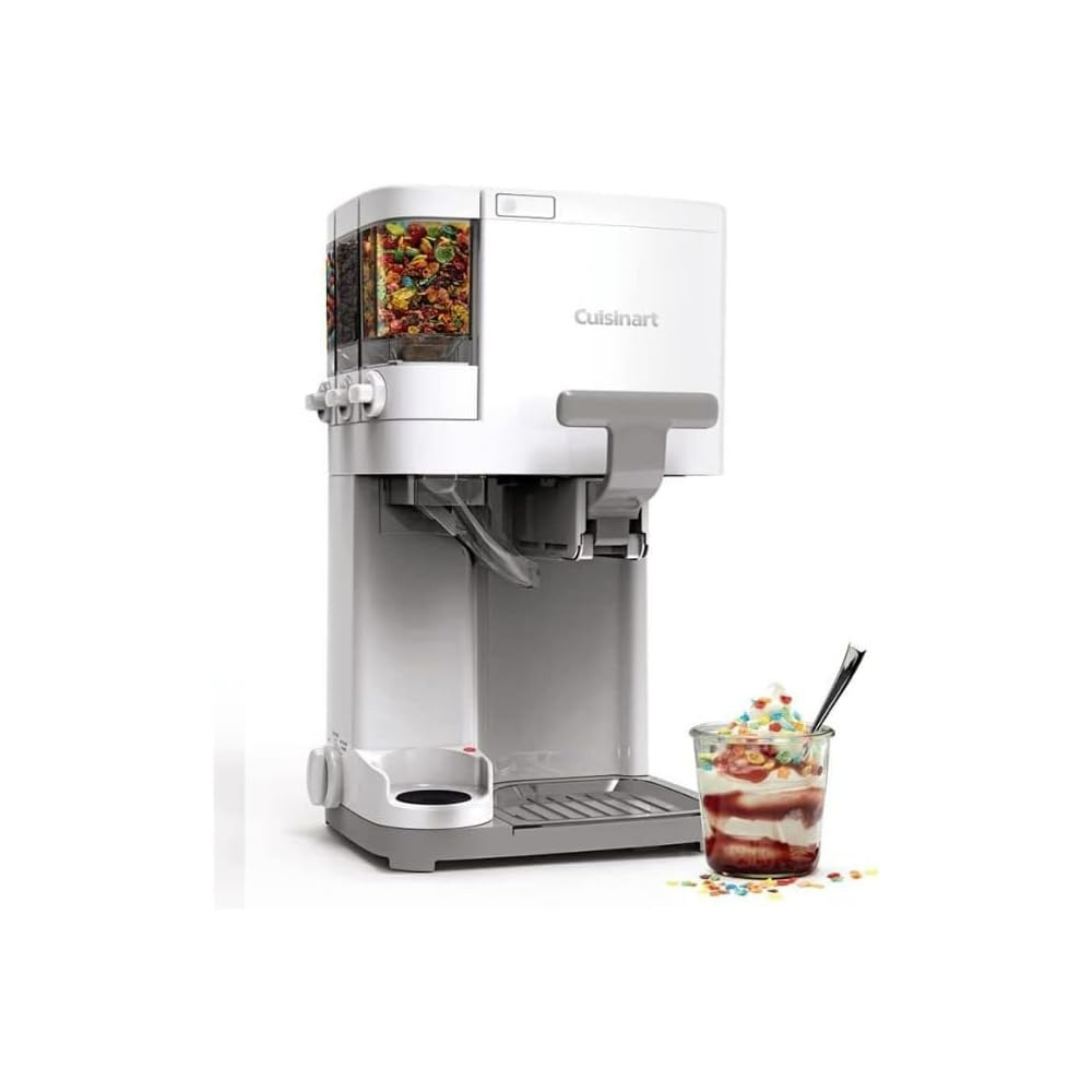 White Cuisinart soft serve ice cream maker with mix-in dispenser and a cup of ice cream topped with colorful candy pieces