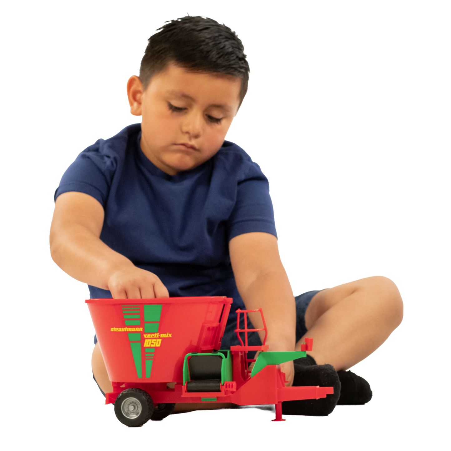 Child playing with red and green Bruder 02127 fodder mixer model from Vehicles & Remote Controlled Toys collection