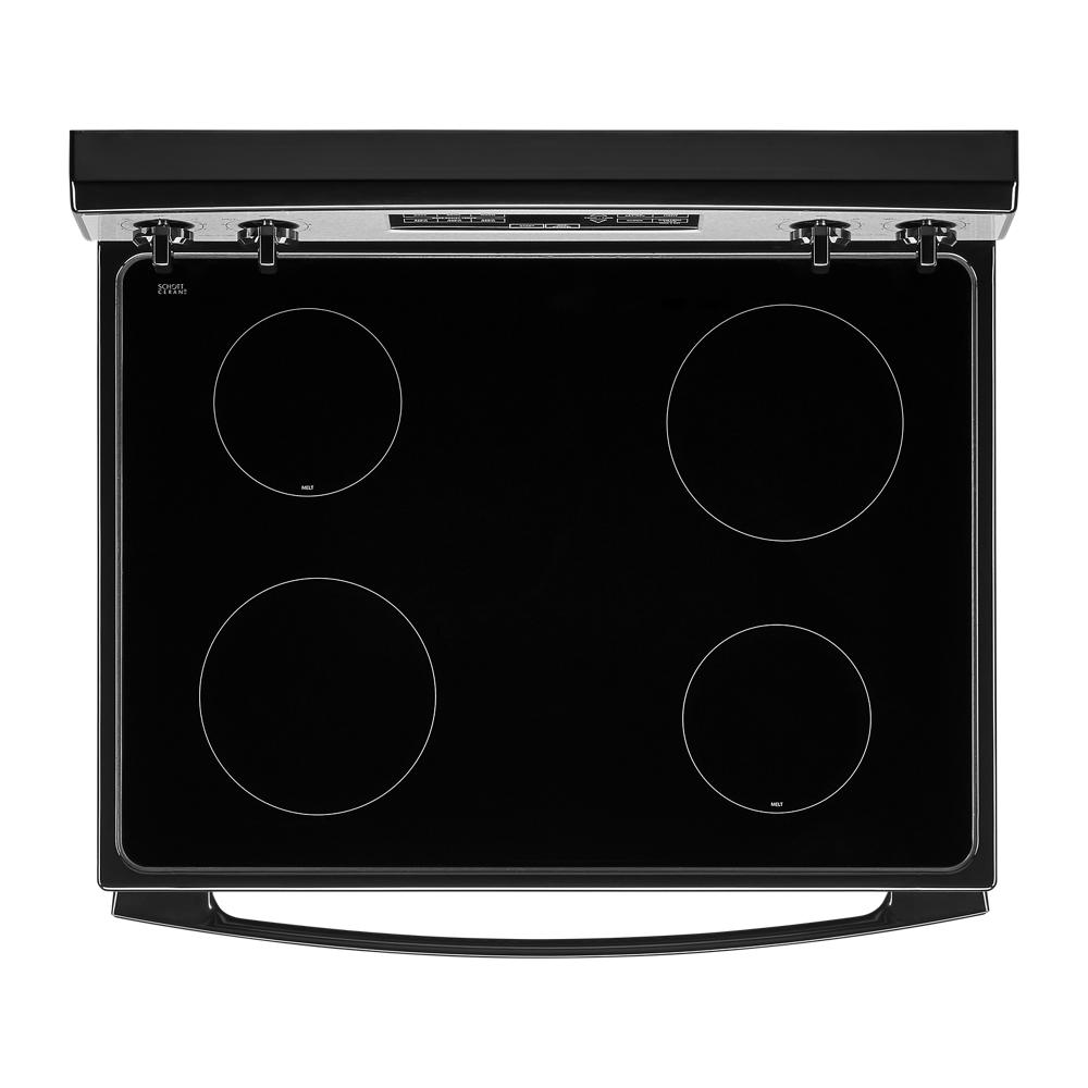 Black electric range cooktop featuring four heating elements with stainless steel trim in kitchen appliances collection