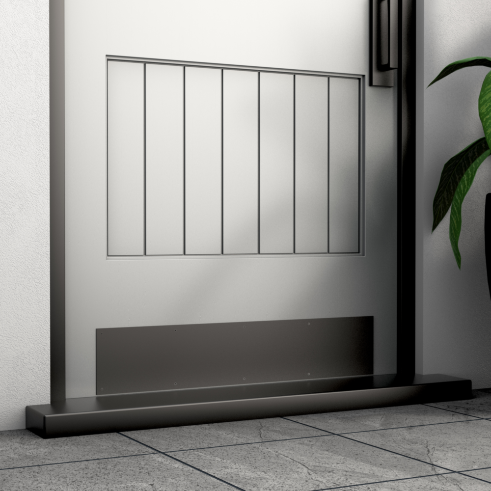 Matte black aluminum door kickplate installed on exterior door protecting the bottom panel in home improvement tools