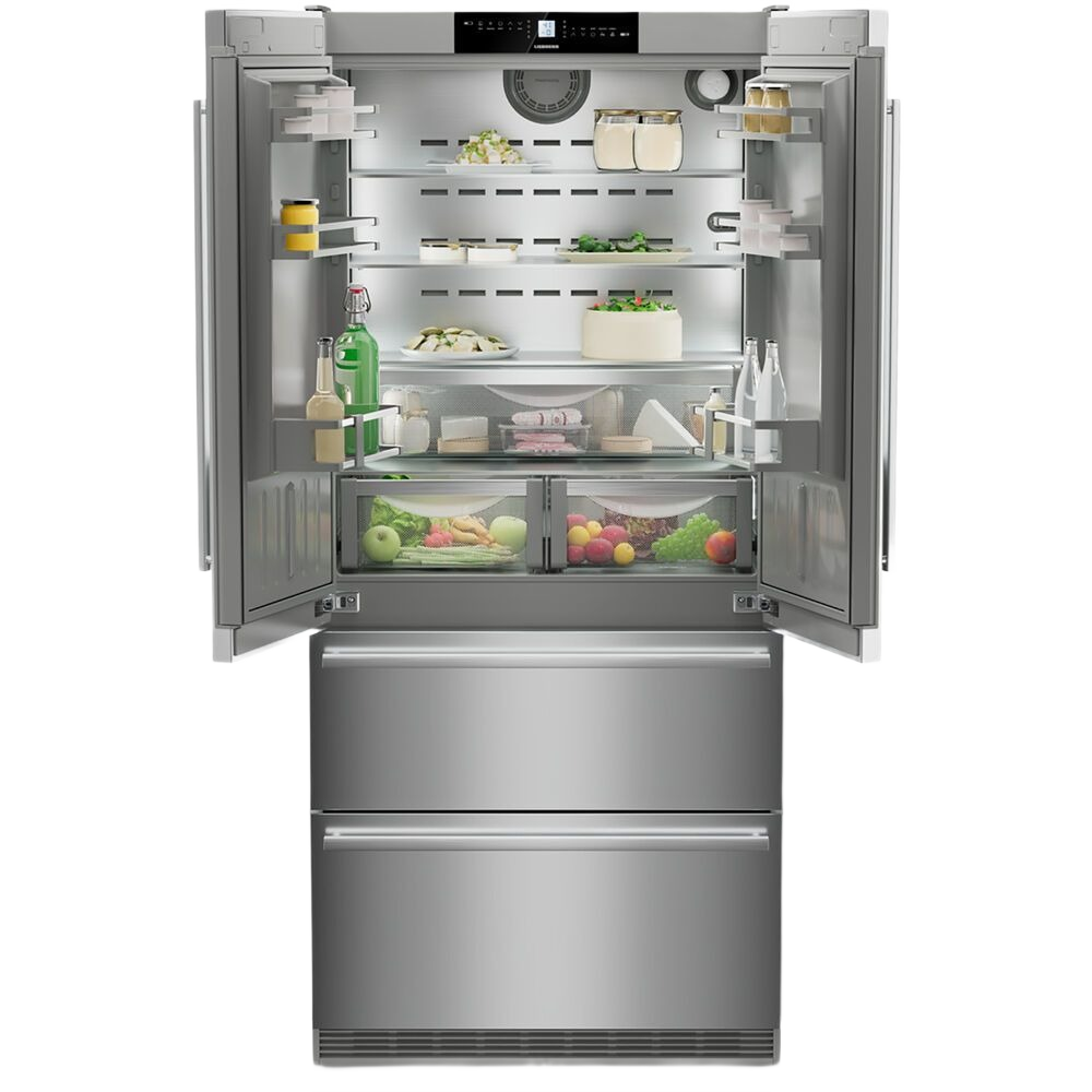 Open view of stainless steel freestanding French door refrigerator with illuminated interior and dual freezer drawers in Appliances collection