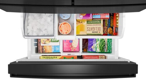 Open flexible temperature drawer in black Whirlpool French door refrigerator showing organized ice and frozen food items.