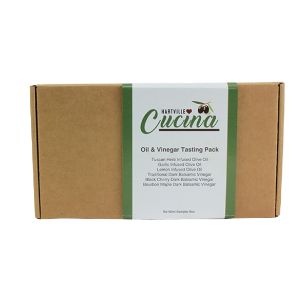 Sampler box of infused olive oils and dark balsamic vinegars in Hartville Cucina tasting pack from oil & vinegar collection