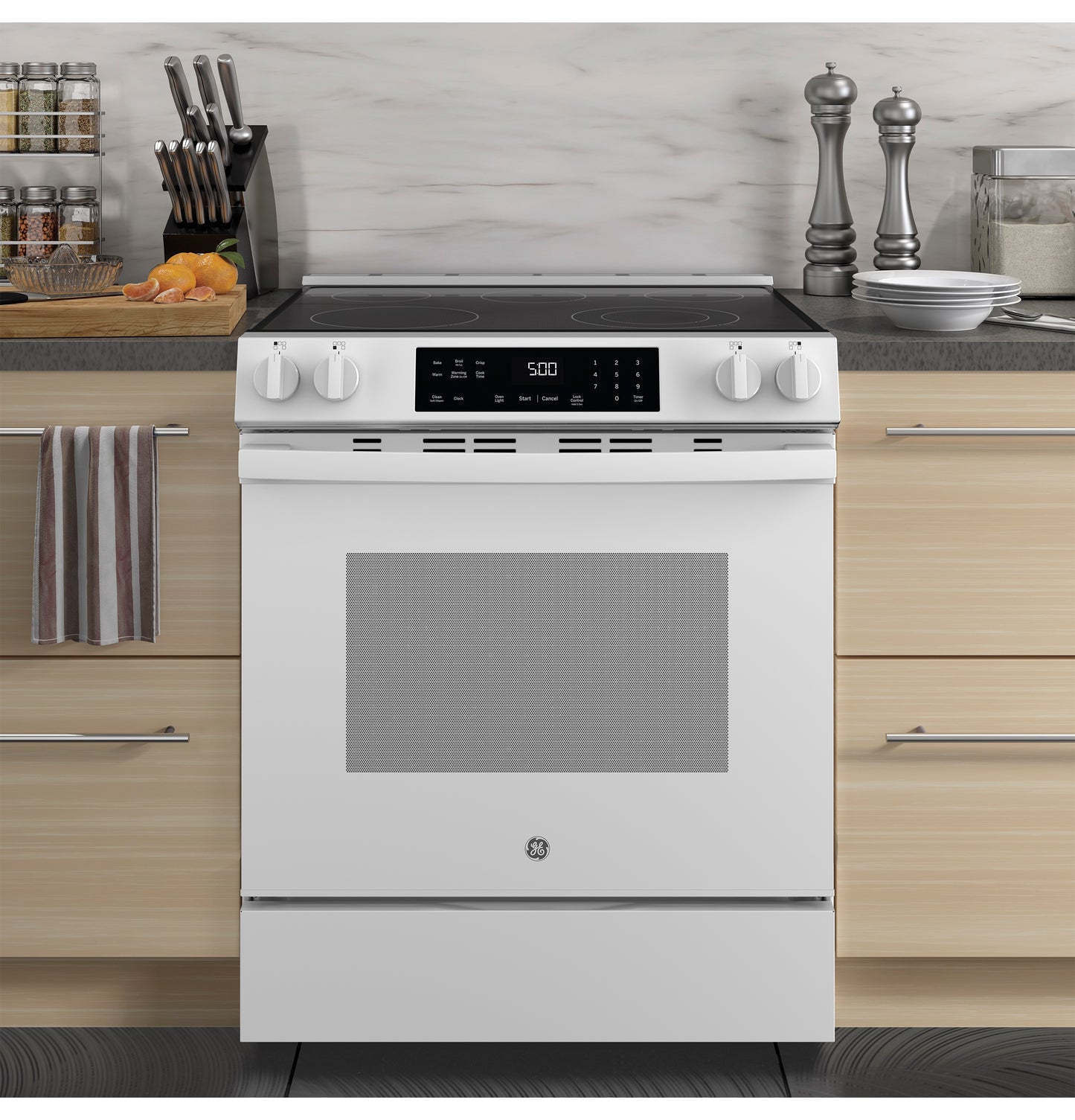 White slide-in electric range with digital touch controls and four knobs in modern kitchen for home improvement tools