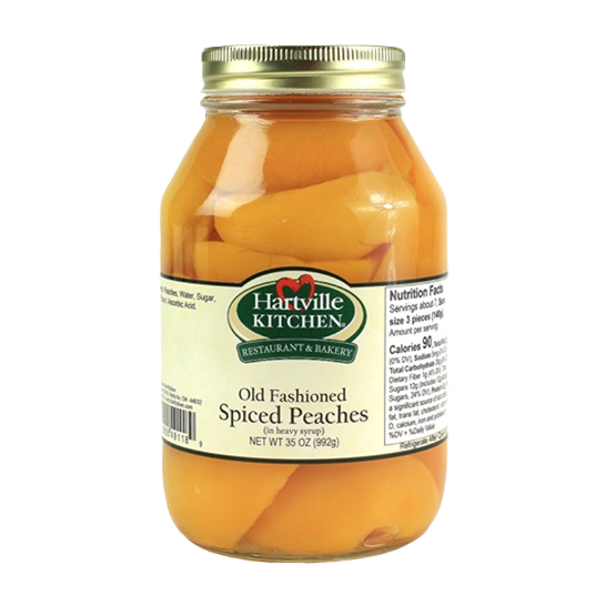 Glass jar of Hartville Kitchen old fashioned spiced peaches in syrup from Jams & Jellies and Food & Beverage collections