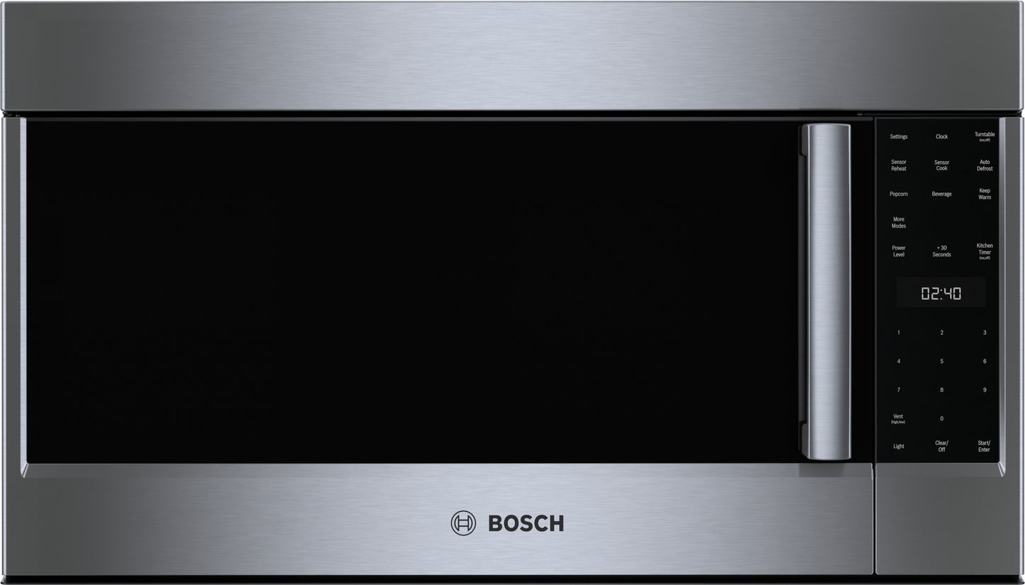 Stainless steel over-the-range microwave with left side-opening door and digital control panel in kitchenware collection