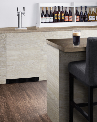 Built-in black kegerator with dual taps integrated into light wood cabinetry in modern kitchen and dining area setting