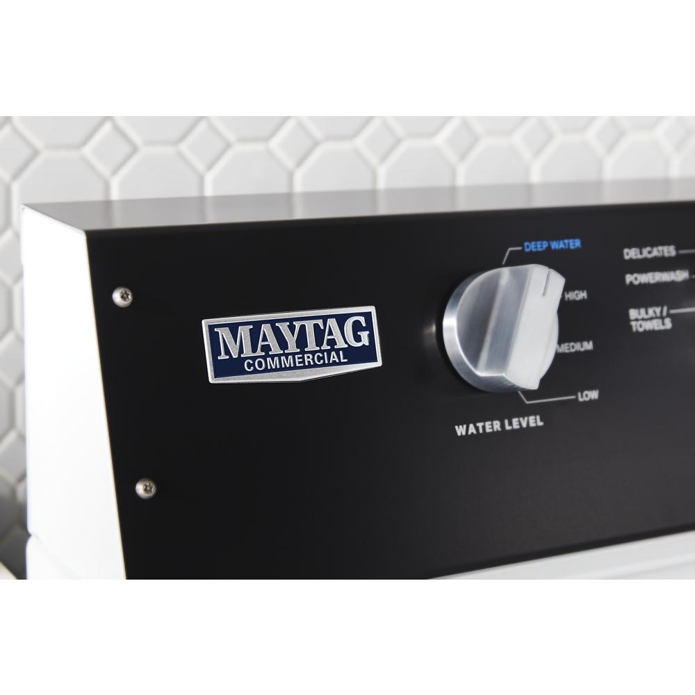 Close-up of black control panel on commercial-grade top load washer with water level dial from washers collection