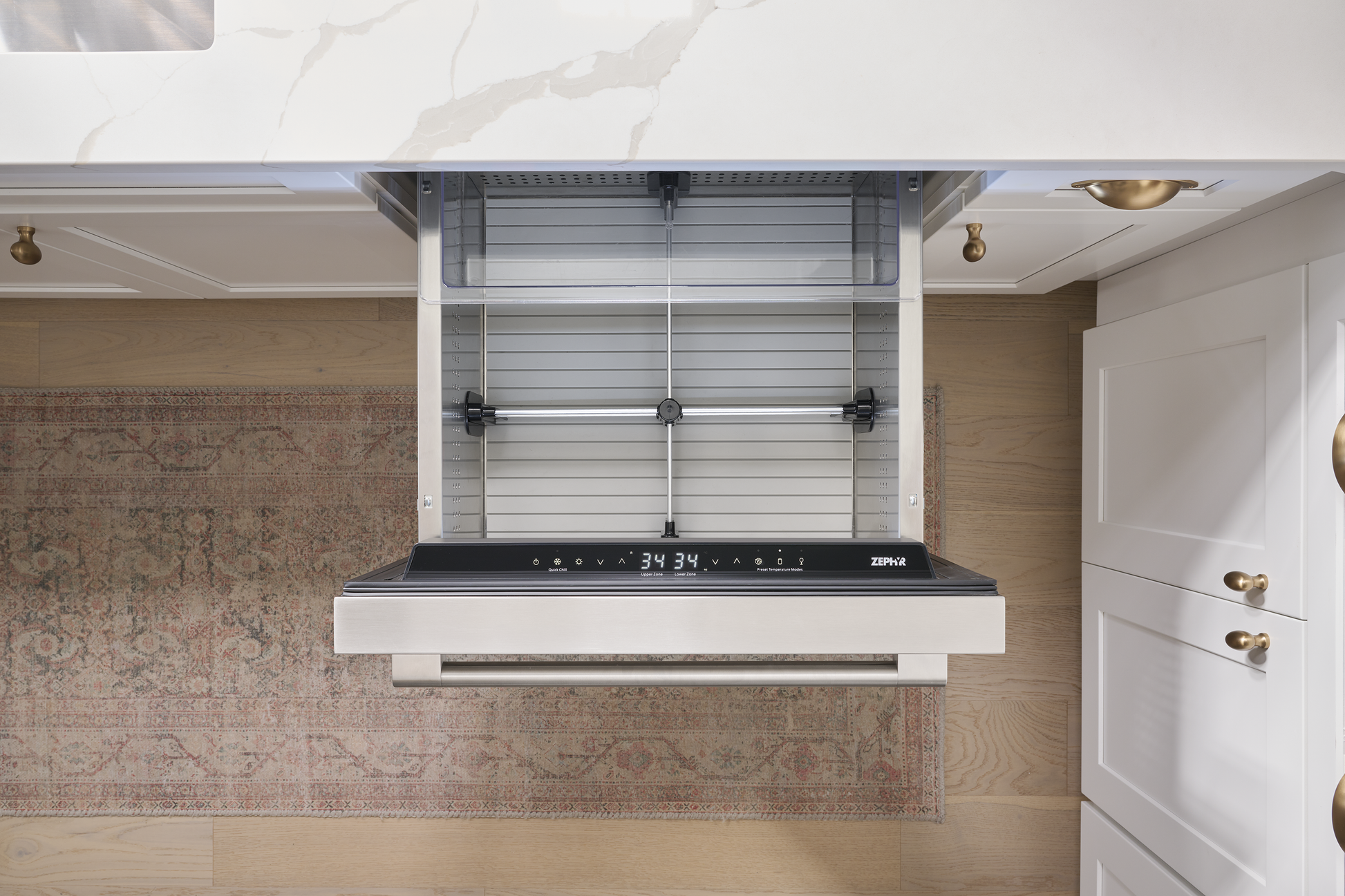 Under-counter stainless steel dual zone refrigerator drawer open with digital controls in kitchen appliances collection