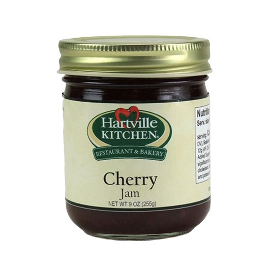Glass jar of Hartville Kitchen cherry jam with gold lid, part of jams and jellies collection under $25