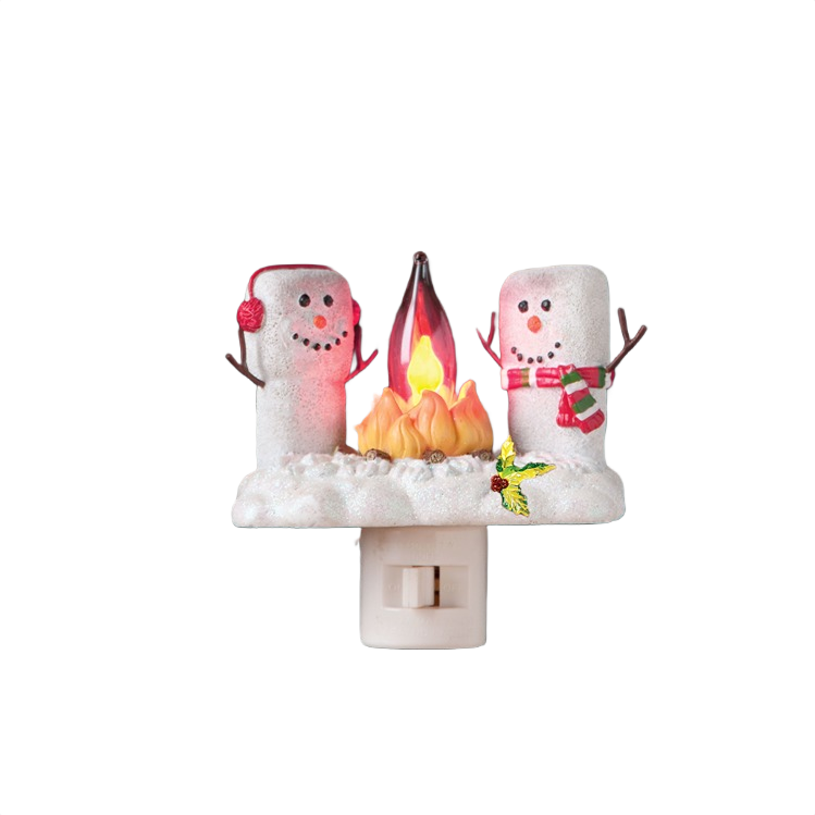 Two marshmallow snowmen with winter accessories around a warm glowing campfire nightlight for Christmas Lights under $50 collection