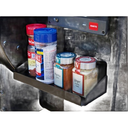 Magnetic spice rack with assorted seasonings attached to grill for convenient outdoor living and grilling organization
