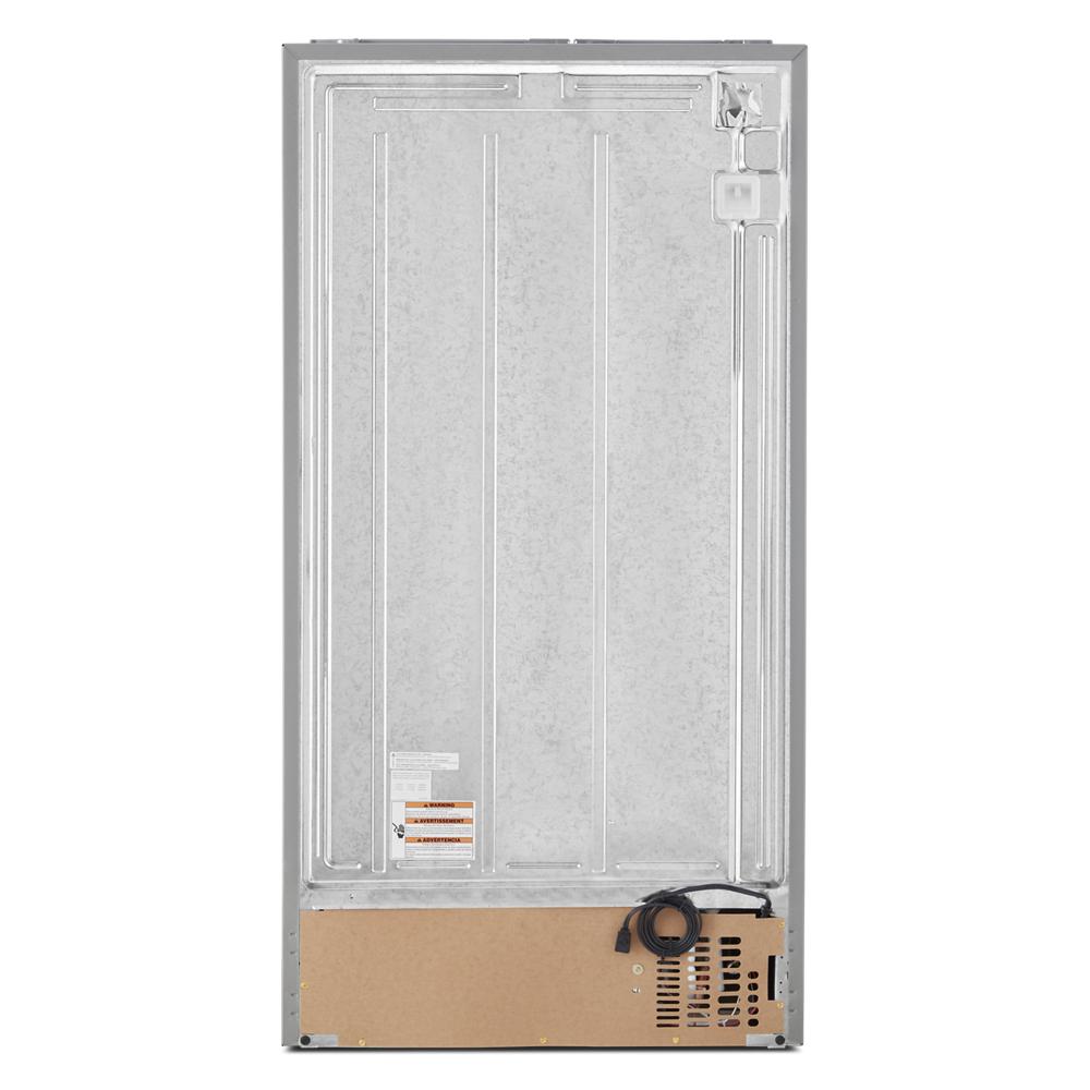 Rear view of a 36-inch wide side-by-side refrigerator with visible compressor and power cord from Appliances collection