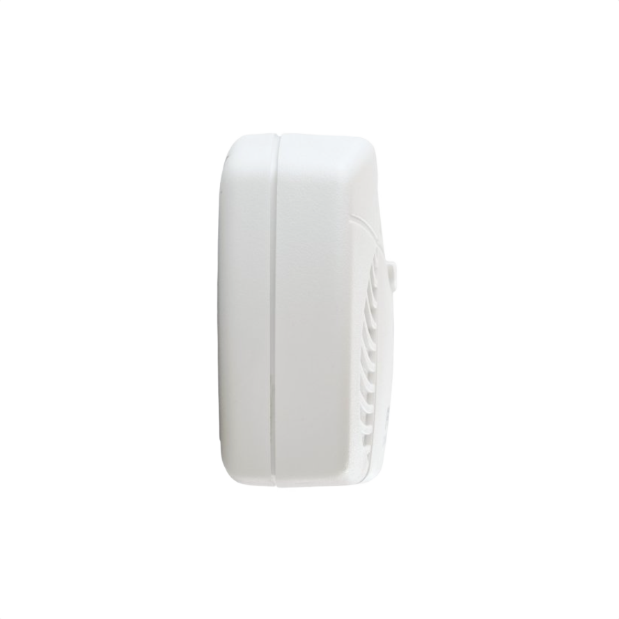 Side view of a white battery-powered carbon monoxide detector for home electrical and fire safety monitoring