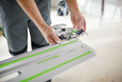 Person adjusting a precision angle stop on a Festool guide rail for woodworking and tool accessories collections
