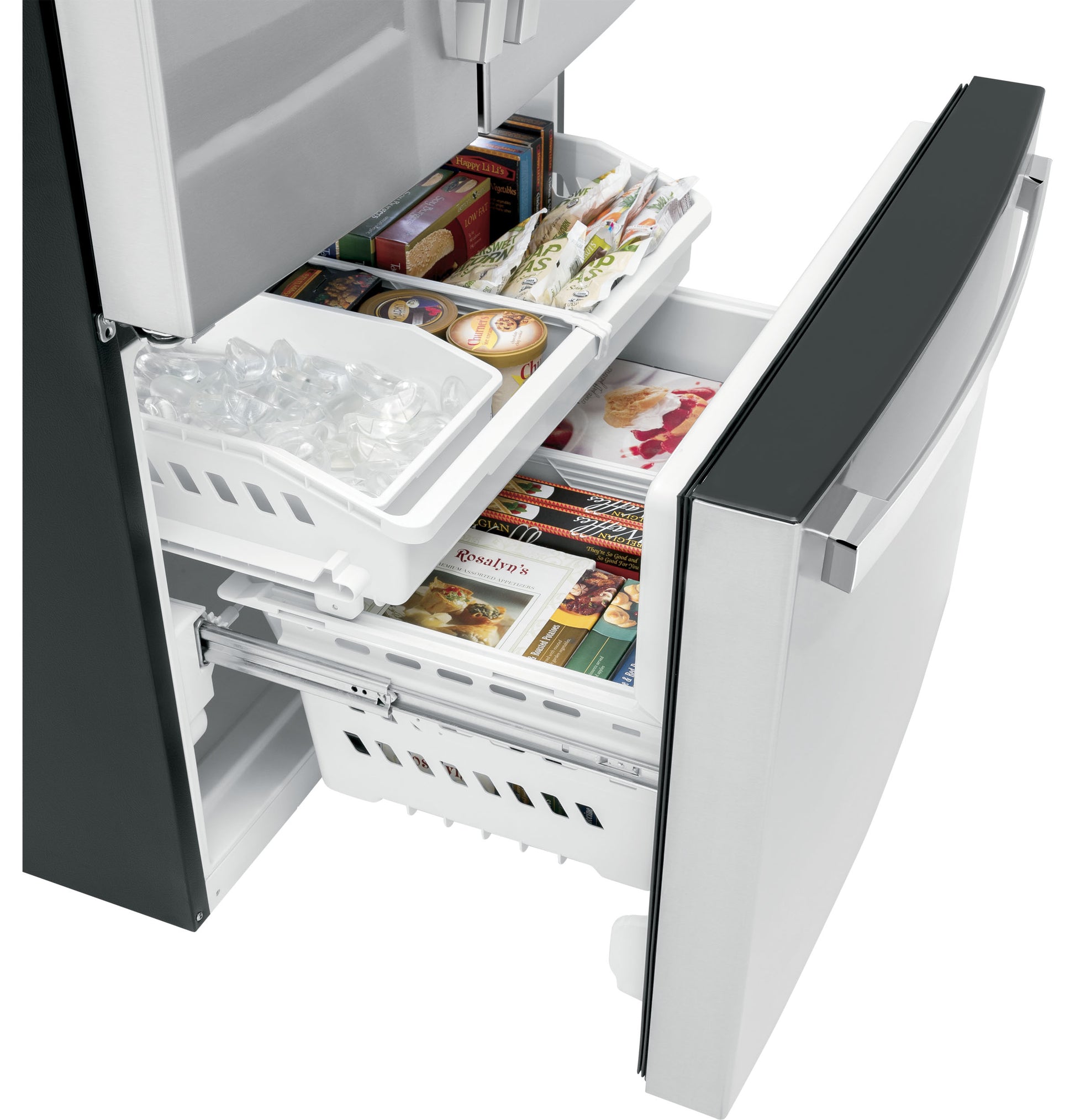 Open bottom freezer drawer with organized frozen foods and ice tray in fingerprint resistant stainless steel refrigerator