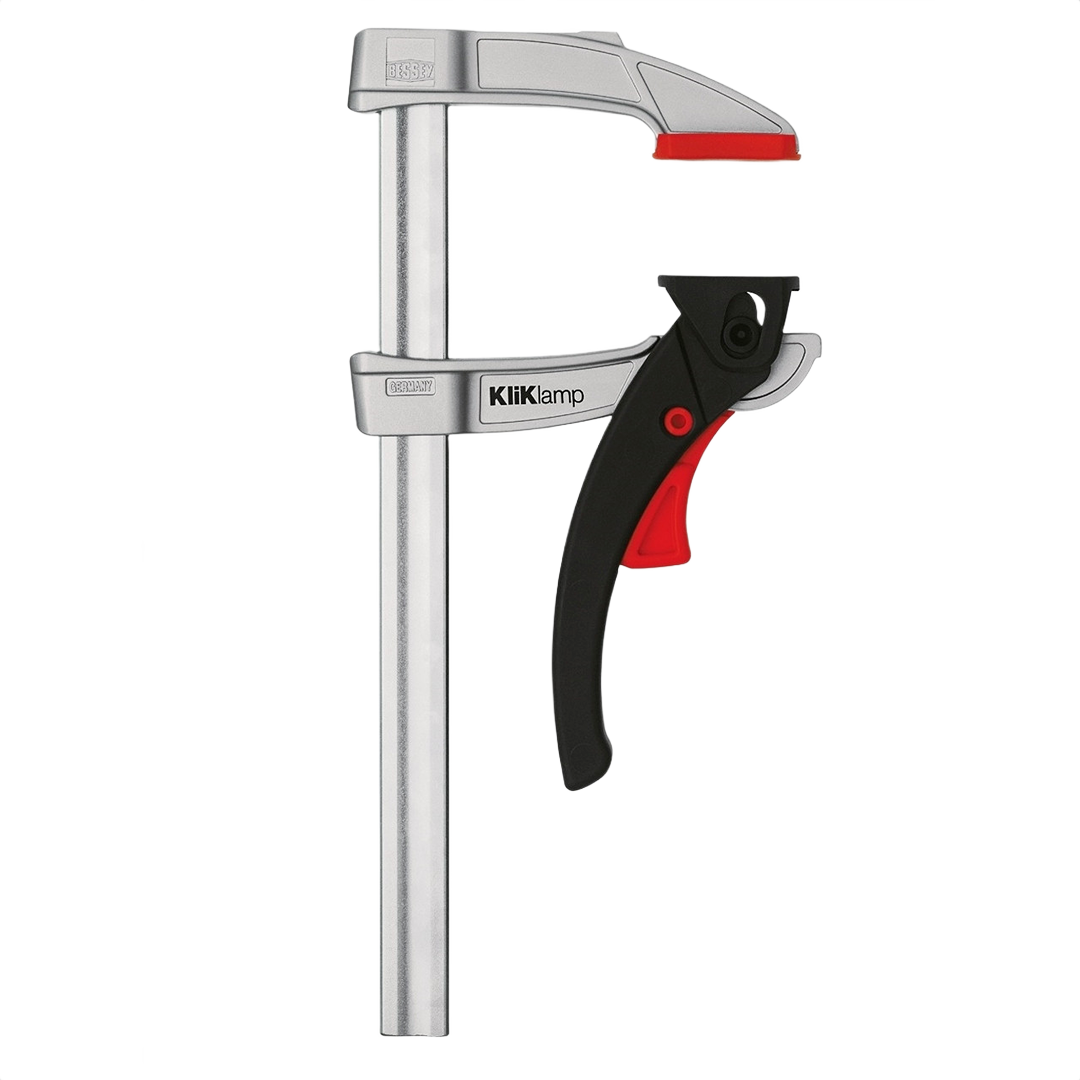Silver and black lever clamp with red trigger handle designed for light duty home improvement projects