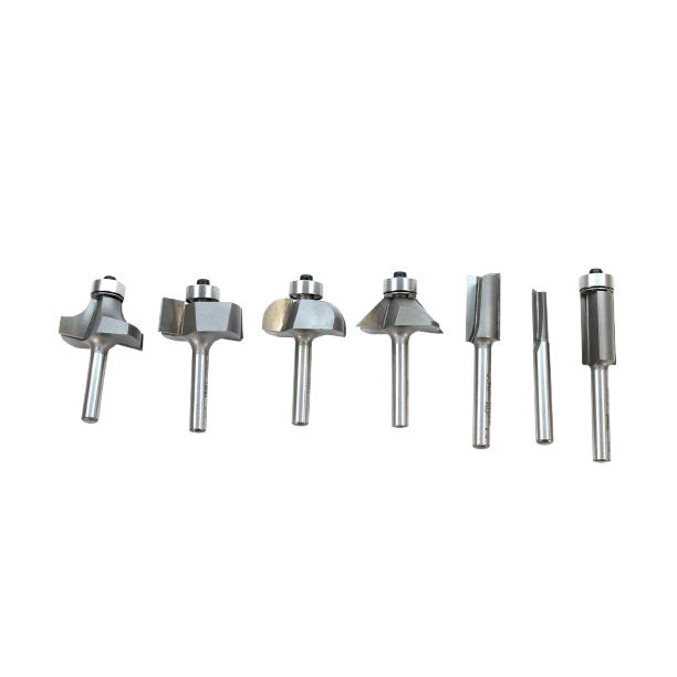 Set of seven polished steel router bits with 1/4 inch shank for woodworking and tool accessories collections