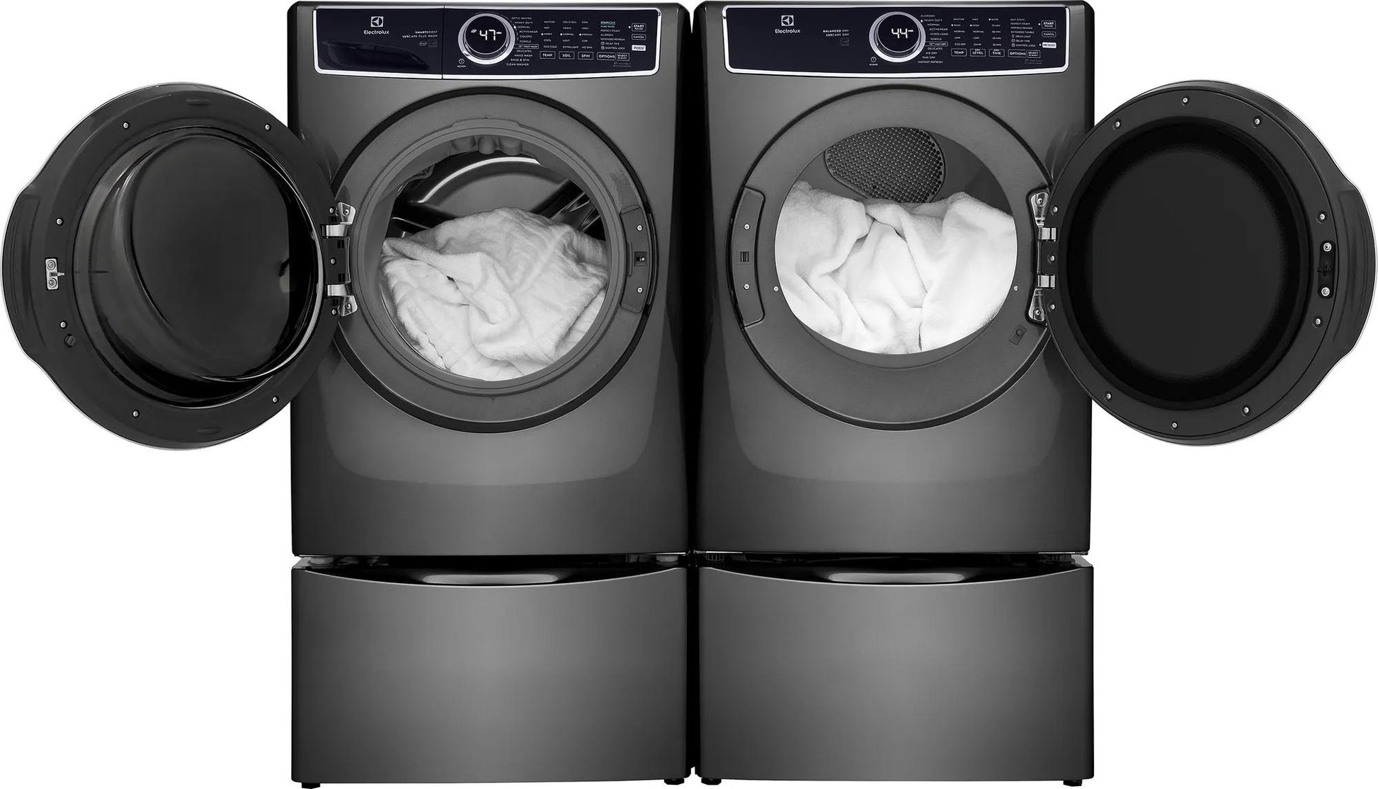 Pair of dark gray front load washers with large open doors showing white laundry inside from washers and appliances collection