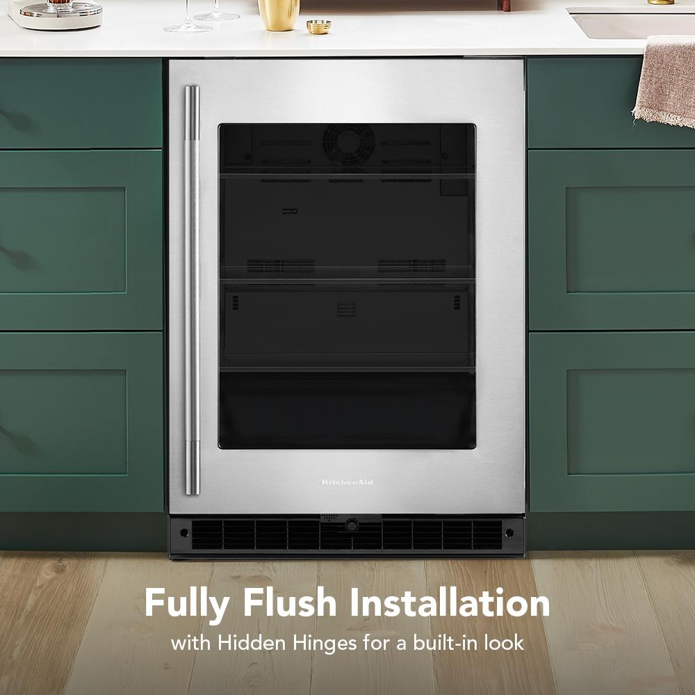 Undercounter refrigerator with stainless steel frame, flush installation, glass door, and stainless handle for kitchen use