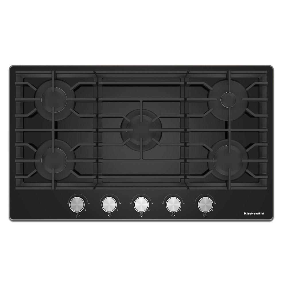 Black gas-on-glass cooktop with five burners and front control knobs from KitchenAid appliances collection