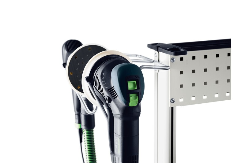 Two-pronged metal hook with rubber caps holding power tools on a perforated workshop organization panel
