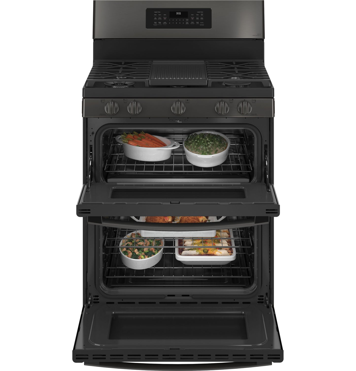 Open view of black free-standing gas range with double ovens cooking multiple dishes in kitchen appliances collection