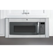 Stainless steel over-the-range microwave installed in white kitchen cabinetry for home improvement appliances collection