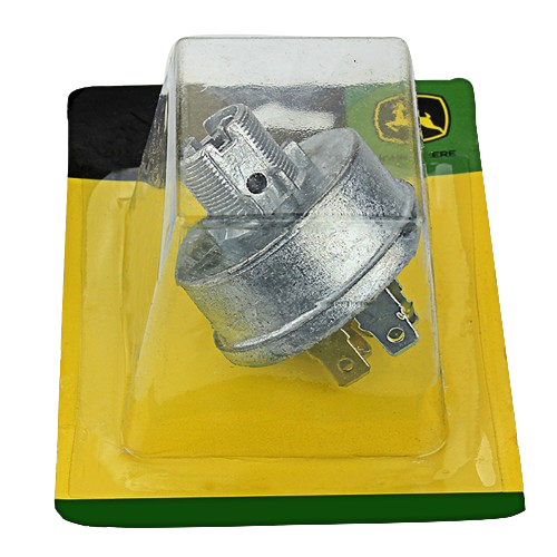 Metal ignition switch component in clear plastic packaging, suitable for automotive and John Deere equipment repairs