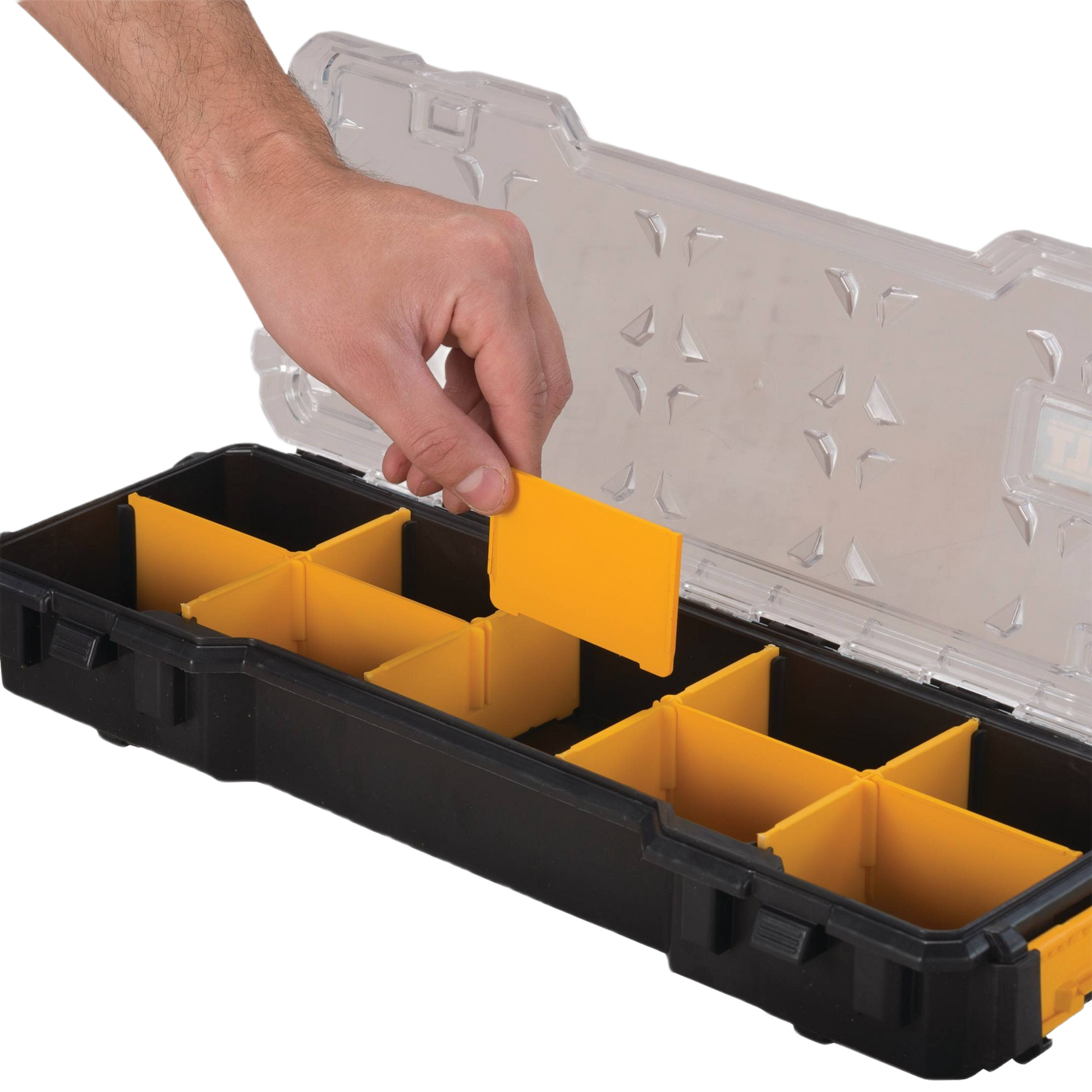 Hand adjusting yellow removable divider in black and clear plastic 10-compartment tool organizer for workshop storage