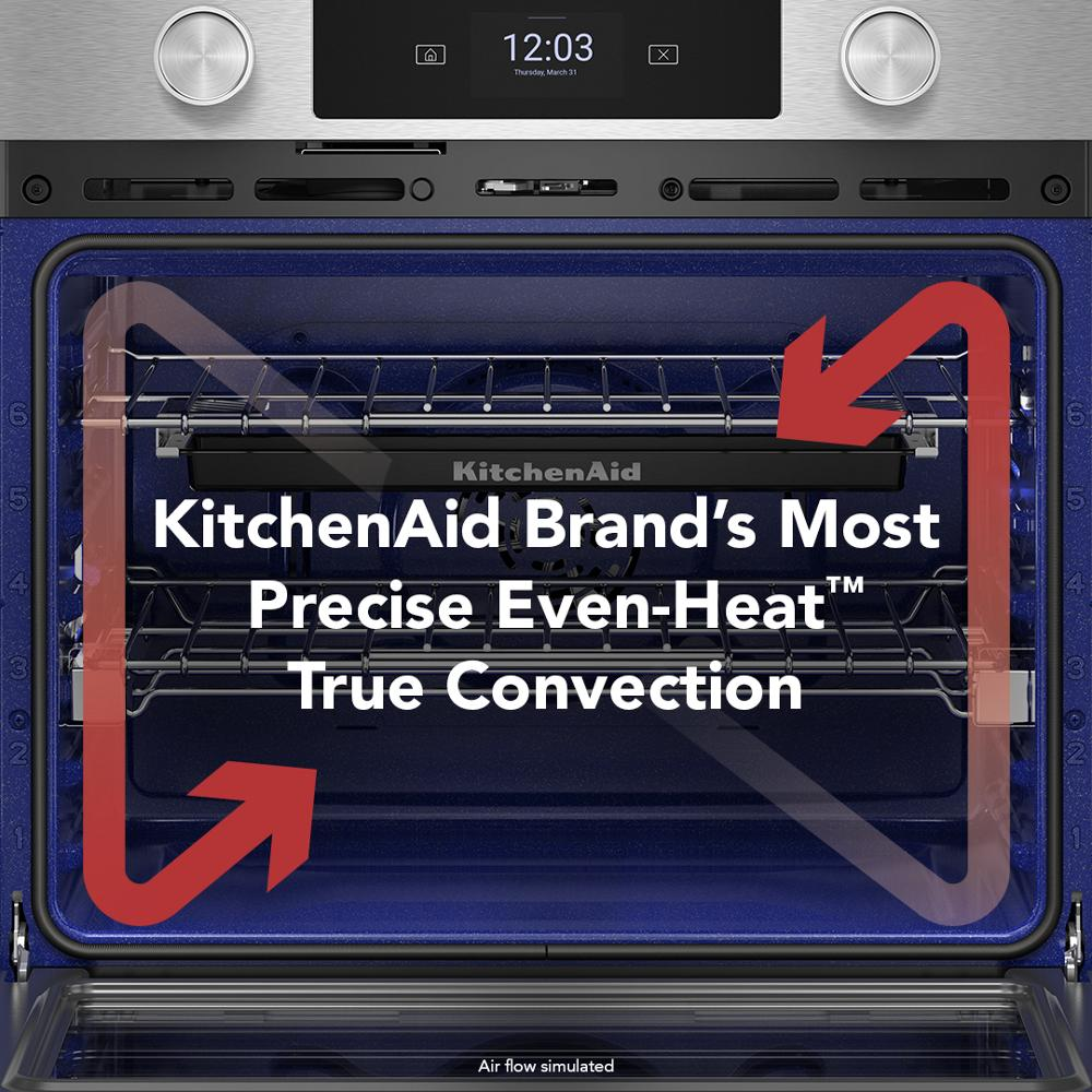 Open white smart wall oven showing dual racks and simulated even-heat convection airflow with red directional arrows