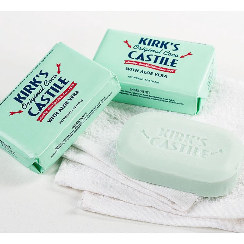 Three aloe vera infused castile soap bars with light green packaging on white towels in Health & Beauty collections